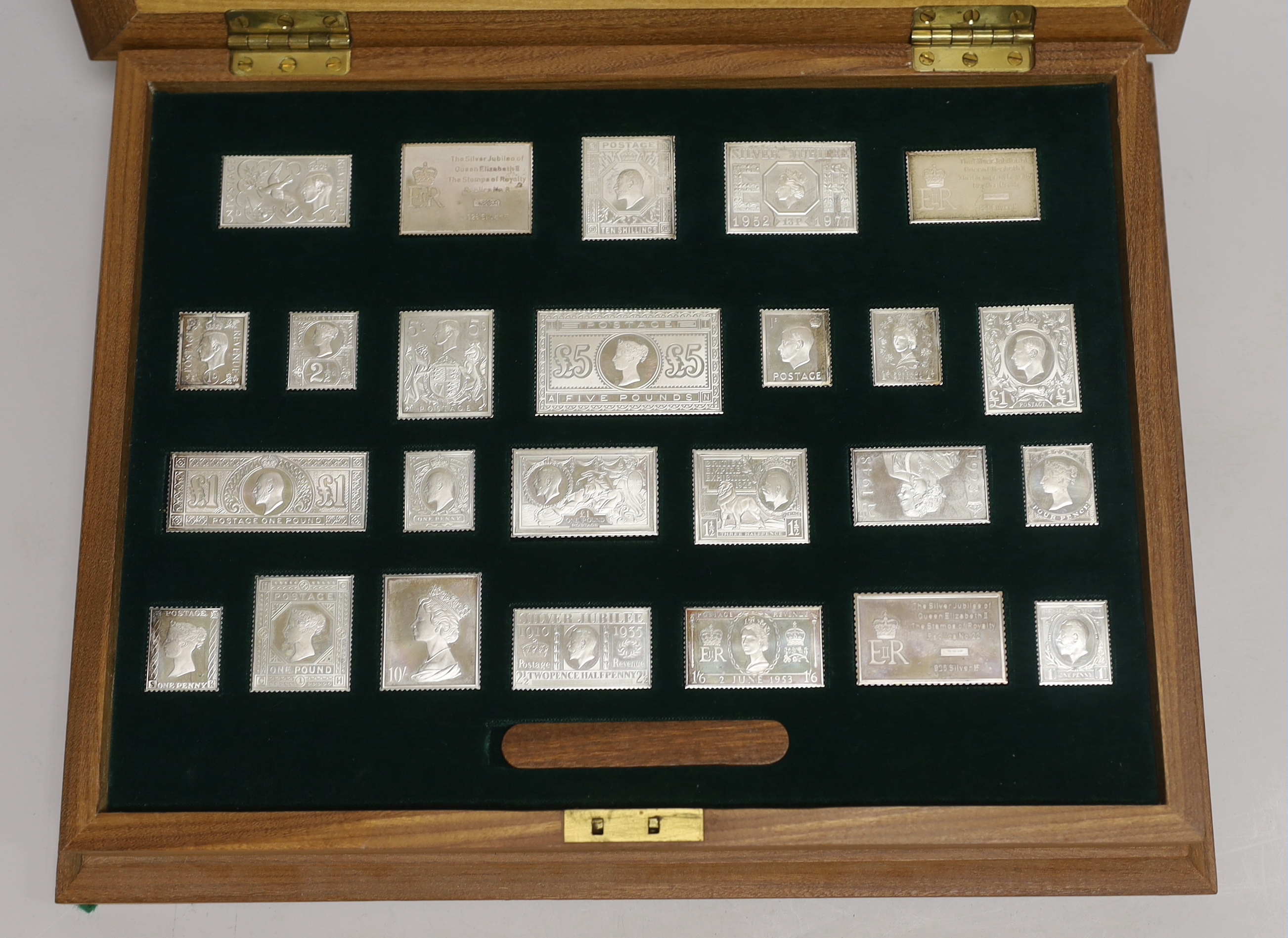 A cased modern set of twenty five silver 'Stamps of Royalty' replicas, with paperwork